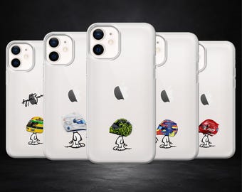 May include: Clear phone cases showcasing diverse racing helmet designs. Each case displays a unique helmet graphic, including yellow, white, green, blue, and red, with a cartoon character. The cases are set against a dark backdrop.