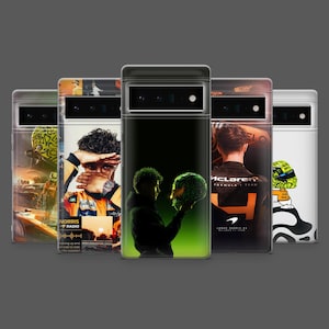 May include: A collection of phone cases featuring Formula 1 racing themes. The cases display images of drivers, helmets, and the McLaren Formula 1 team logo. The cases are in various colors, including black, green, orange, and white.