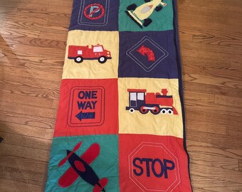 Quilted toddler sleeping bag transportation theme blue green red yellow
