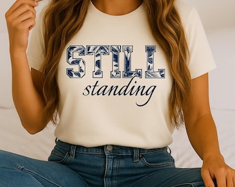 Grafisk t-shirt för kvinnor med motståndskraft, empowerment, komfortfärger, mental hälsa, blommig typografi, stillstående meddelande