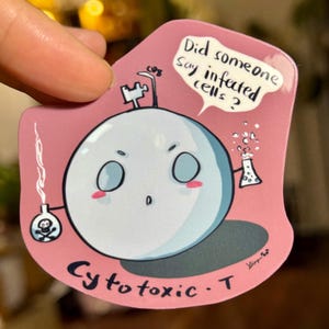May include: A pink sticker featuring a cartoon cell with a lab coat and a speech bubble that says, "Did someone say infected cells?" The sticker also has the text "Cytotoxic-T".