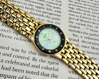 Vintage Goldtone and Silvertone Watch With Mother Of Pearl Face And Date Citizen Women main image 4
