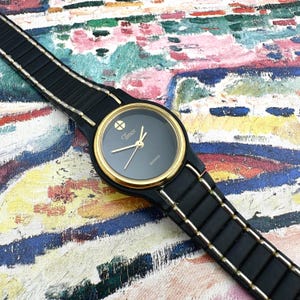 Vintage Timex Women’s Watch with Black Dial, Gold Accent Bezel, Minimalist Style Band, Retro Quartz Y2K Gift for He