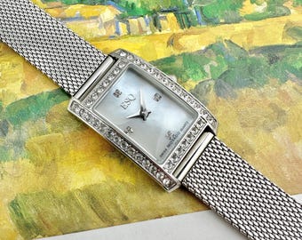 ESQ Movado Ladies White Dial Two Toned Stainless Steel Water 