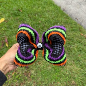 Handmade Halloween monster inspired googly eye layered bow, baby bow, boutique bow