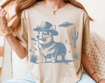 Camiseta de vaquero Corgi, divertida camiseta de corgi occidental con ovnis y escena desértica, camiseta retro, regalo, camiseta vintage de rodeo para amantes de los corgis.