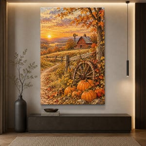 Könnte beinhalten: Ein vertikaler Wandkunstdruck, der eine herbstliche Landschaft bei Sonnenuntergang zeigt. Die Szene umfasst eine rote Scheune, eine Windmühle, einen Feldweg, einen Holzzaun, ein großes Wagenrad und mehrere orangefarbene Kürbisse auf dem Boden.