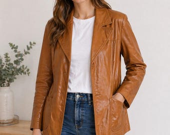 A "Dav Mark Genuine Leather" jacket Vintage size 14 women's