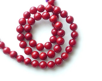 10mm   Red shell  based beads, Full strand (16 inches)