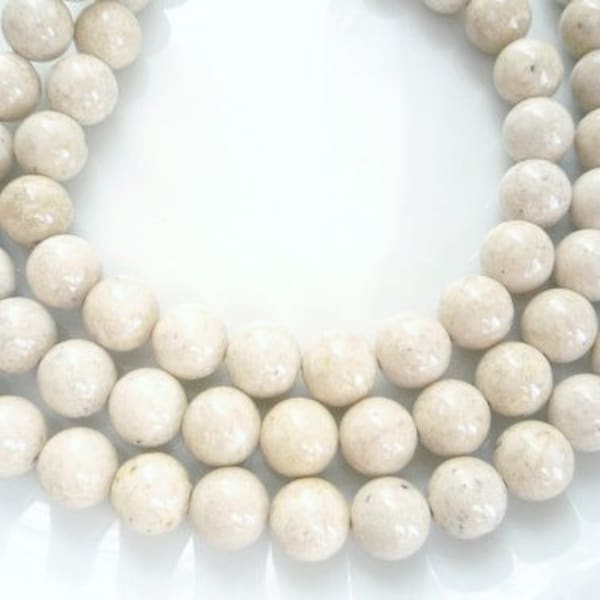 10mm River stone, creamy white  round beads, full strand