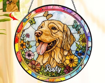 May include: Round stained glass window featuring a golden retriever with its tongue out, surrounded by colorful flowers and butterflies. The dog's name, "Rusty", is written in cursive. A smaller image of the dog is in the upper left corner.