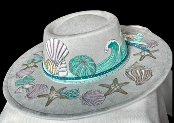 Beach inspired Hand-Burned & hand-painted Vegan Suede Wide Brimmed Hat, oval top. Sea shells, waves, and beautiful colors of teal and pink.