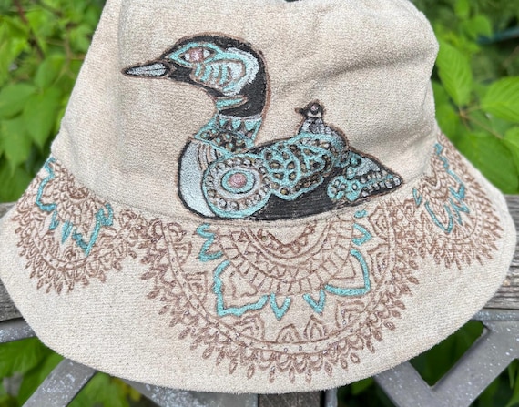 Hand Burned Loon Bucket Hat, Vegan Suede, Metallic Teal Accents