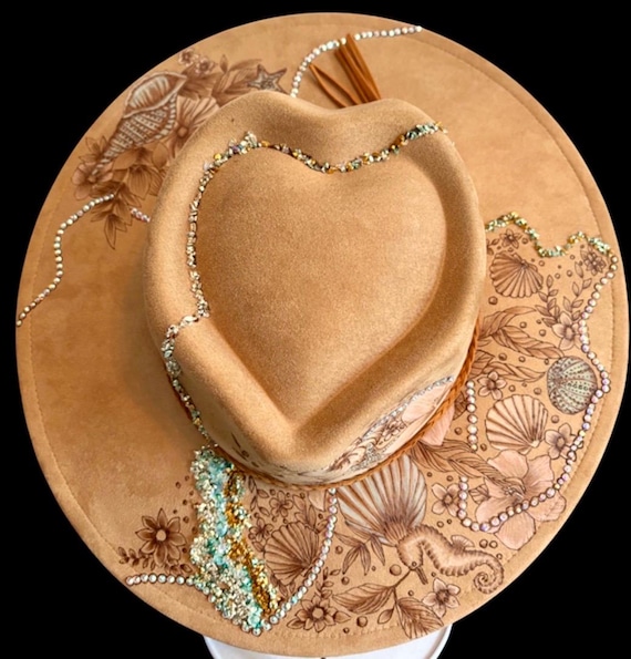 Beach sparkle! Hand-Burned & hand-painted Vegan Suede Wide Brimmed Hat. Sea shells, florals and beautiful bling! Muted pink and sea green.