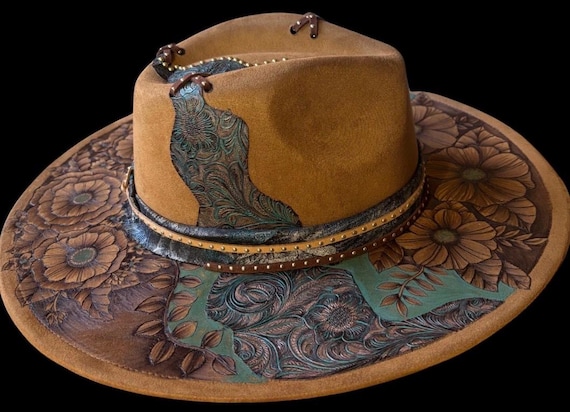 Floral teal and copper. Hand-Burned Faux Suede khaki brown wide brim Hat. Highly detailed free-hand design. Faux leather, studded lacing.