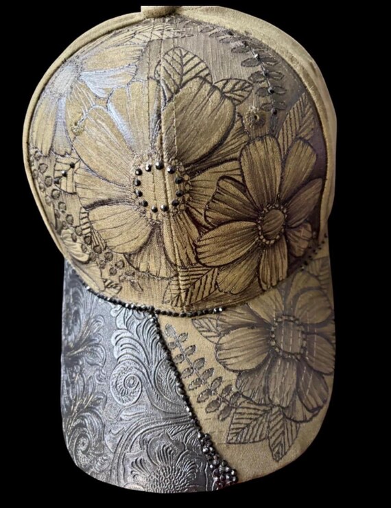 Olive Green faux suede ball cap, free-hand burned floral with black Rhinestones & tooled leather brim.