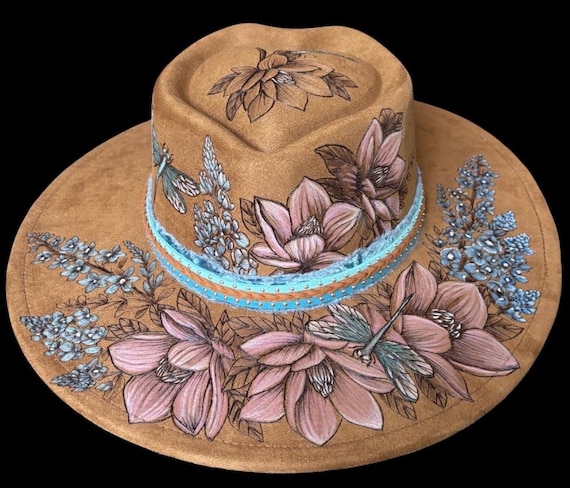 Dragonfly Magnolia and blue bonnets Hand-Burned Vegan Suede wide brim hat. Hand painted with permanent acrylic paint. Heart shaped crown.