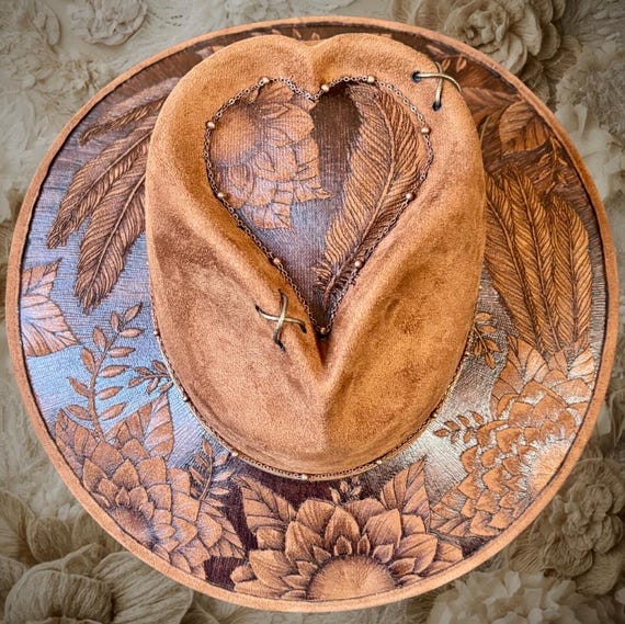 Free-Hand Burned Art, floral and feathers, wide brim heart top hard-body hat, size medium Khaki Brown vegan suede. Pull down Indiana style