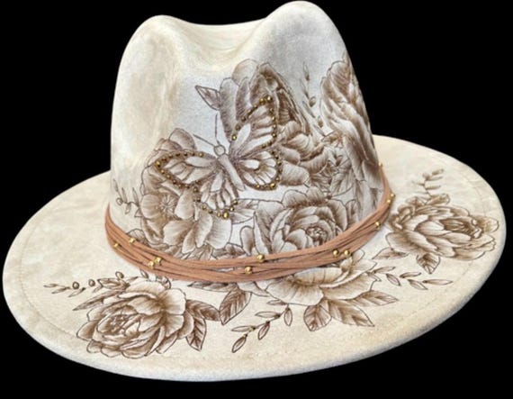 Butterfly peony Fedora! Hand-burned using a wood burning tool. Gold rhinestones added for a bit of sparkle. Leather tie on hat band.