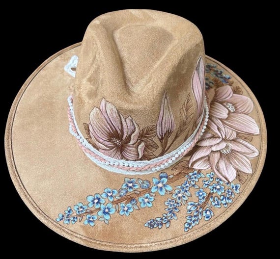Bargain priced! Magnolia and blue bonnets Hand-Burned Vegan Suede hard body rancher style hat. Hand painted with permanent acrylic paint.