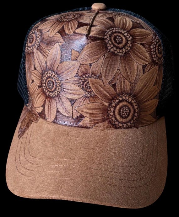 Simply sunflowers reverse burned , hand-burned Vegan (faux) suede khaki brown trucker hat with black mesh back.