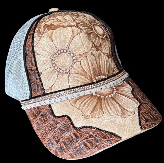 Free-hand, Hand-Burned, Floral, tan front, grey mesh ponytail back Ball Cap, alligator faux leather, rhinestones, and leather lacing.