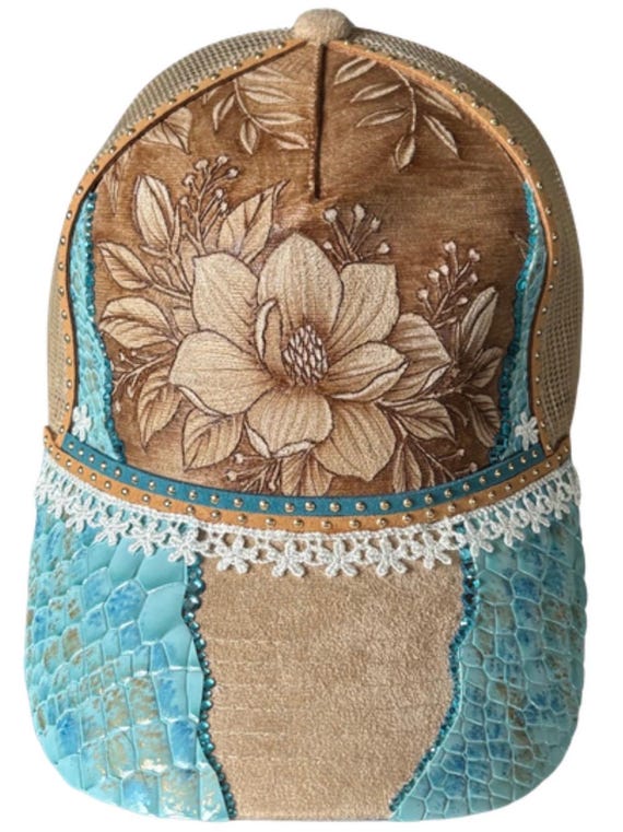 Hand-Burned magnolia design. Tan Vegan Suede with mesh back. Light blue faux alligator leather, gold, bronze & teal accents. White lace trim