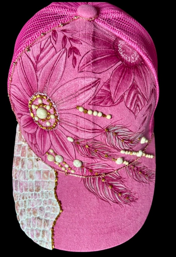 Barbie pink with gold, brown, and ivory accents. Free-hand Hand-Burned Ball Cap, Faux Suede, faux alligator Leather to match, dream catcher