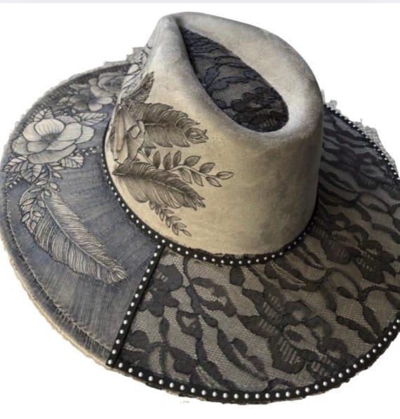Hand-Burned using a wood burner, feminine flowers and feathers. Black lace on grey Vegan Suede Wide Brimmed Hat