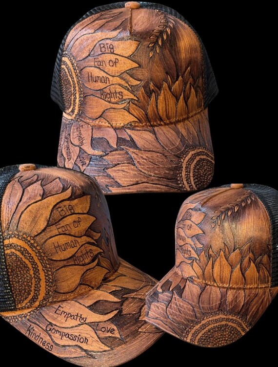 Big fan Human Rights. Hand Burned trucker hat, Vegan Suede. Sunflowers.