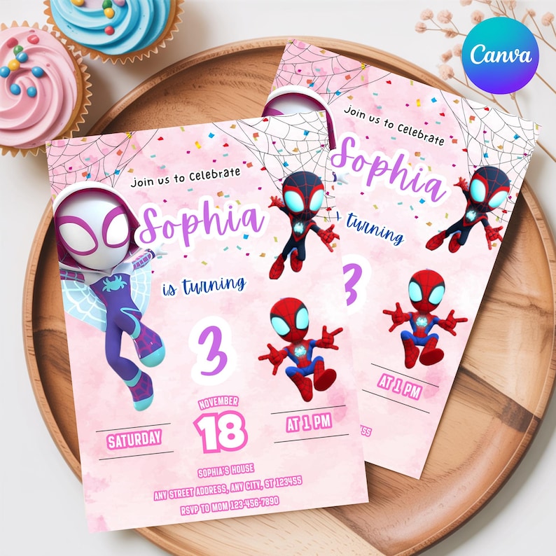 May include: Two pink birthday invitations with Spider-Man theme. The invitations read "Join us to Celebrate Sophia is turning 3" with event details. The invitations are on a wooden tray with cupcakes in the background.
