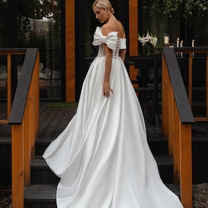 Off-Shoulder Wedding Dress with Corset Back and High Slit | Satin Bridal Gown with Removable Bow Sleeve