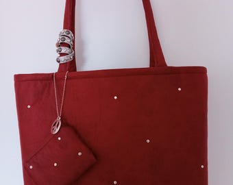 Bolso tachuelas granate.