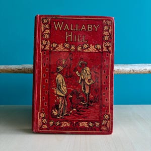Antyczna australijska książka „Wallaby Hill” autorstwa M. Bradforda Whitinga, wydanie z początku XX wieku