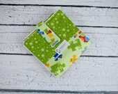 gender neutral travel diaper mat puzzle piece autism awareness