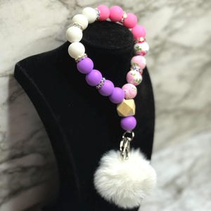 Floral Silicone Bead Keychain: Rhinestone Accents & White Pompom