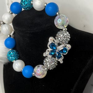 Blue Rhinestone Butterfly Keychain: Beaded Wristlet with Pom