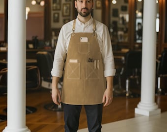 Delantal de barbero de cuero bronceado hecho a mano con bolsillos para salones y estilistas / Delantal de trabajo profesional, regalo para hombres, logotipo personalizado, ajuste personalizado.