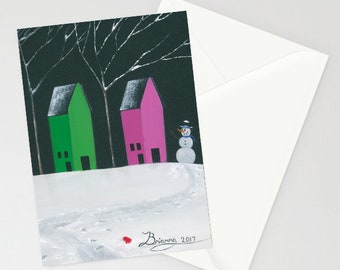 Three Little Houses - Folk Art Winter Christmas Card - Green & Pink Houses, snowman under naked tree with snow on branches, lost red mitten