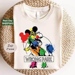 Wrong park shirt, disney shirt, disney wrong park shirt, mickey shirt, dinosaur shirt, dinosaur cartoon, tyrannosaurus shirt, tyrannosaurus
