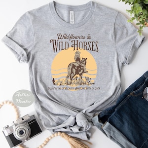 a t - shirt with the words wild horses on it