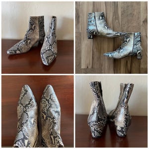 Puede incluir: Botines con estampado de piel de serpiente en tonos grises, negros y blancos. Los botines tienen puntera afilada y tacones pequeños. La imagen muestra los botines desde varios ángulos. Los tacones miden unos 5 cm.