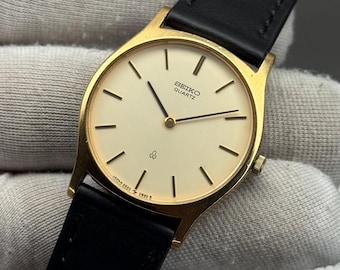 Zeldzaam Seiko Quartz 2620-0170 ronde vorm gouden wijzerplaat vintage quartz herenhorloge Japan