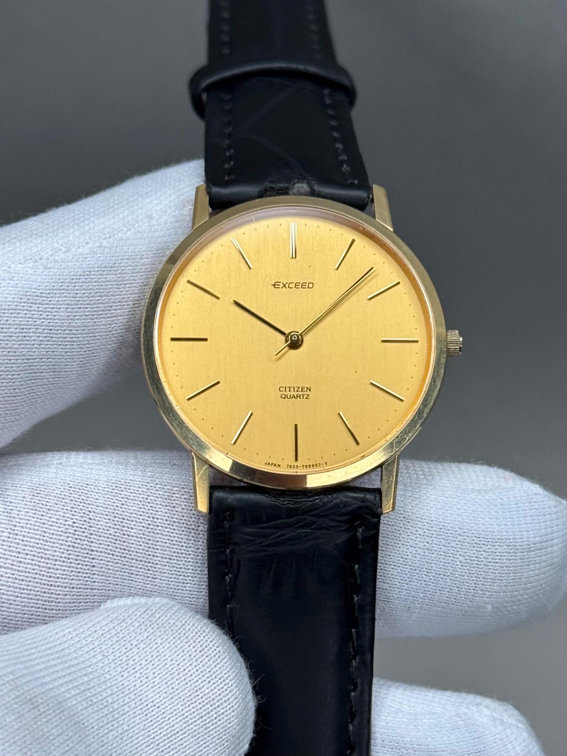 CITIZEN EXCEED ブランド腕時計 14K BEZEL Citizen Exceed Quartz Men's Watch 35mm | Golden Dial | Ref. 798295