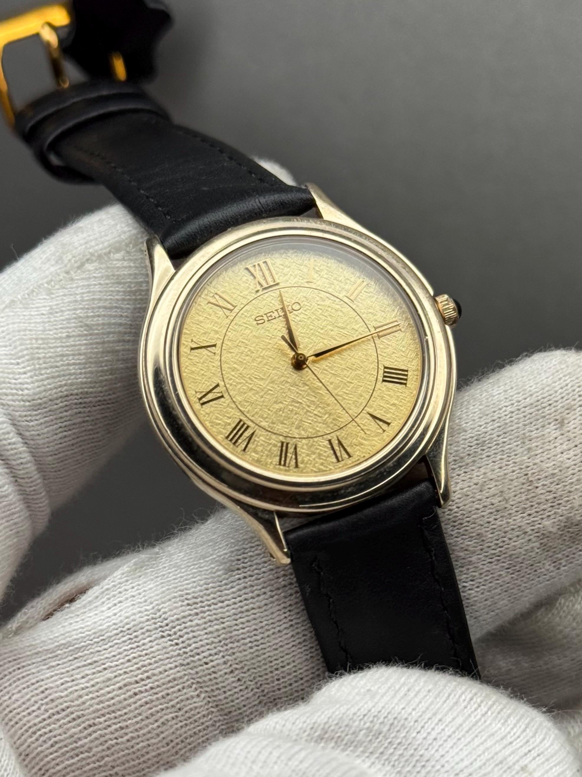 SEIKO QZ ビンテージ　腕時計 Vintage Seiko QZ Quartz Watch: Gold Roman Numeral Dial