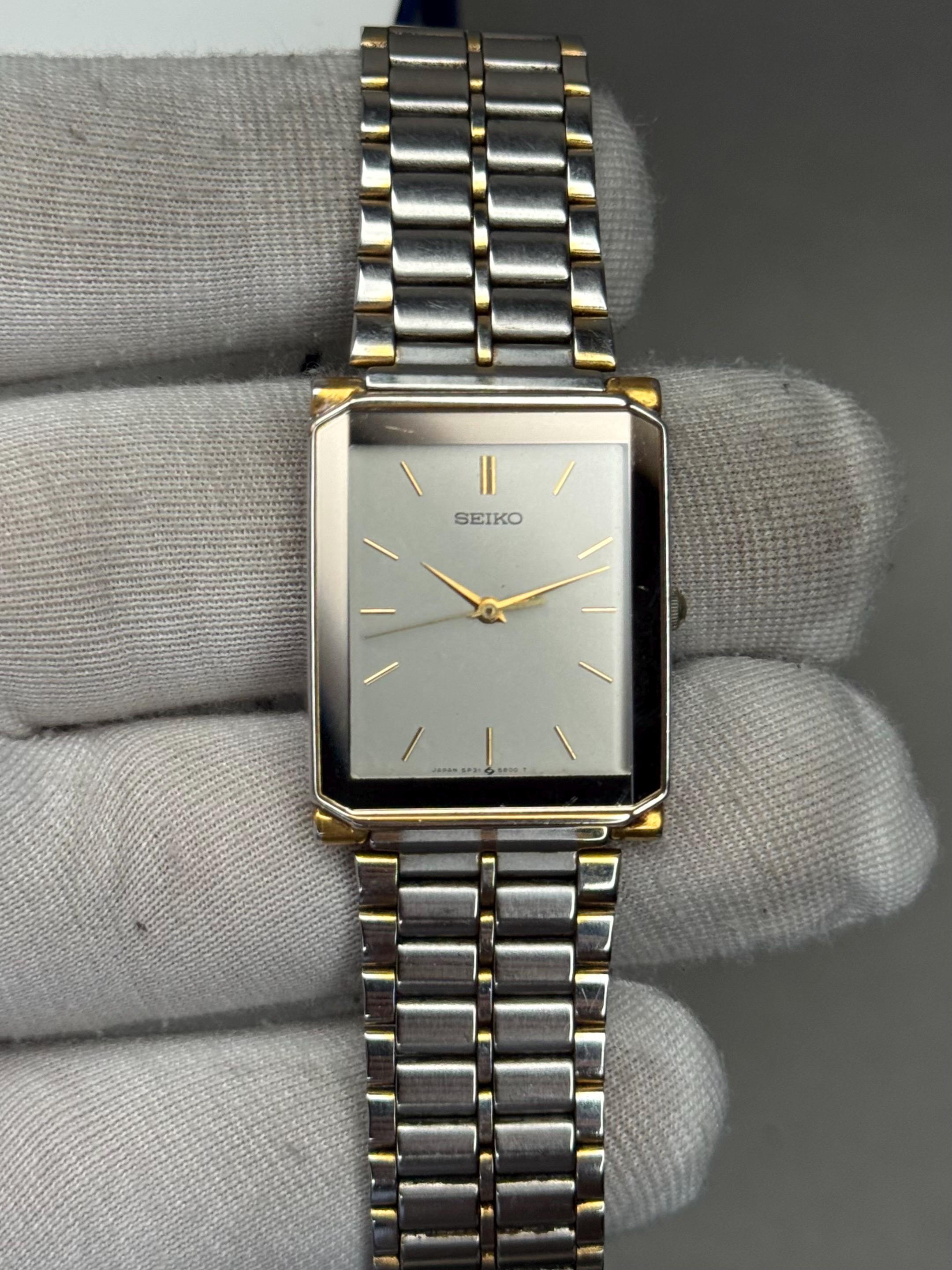 Vintage Seiko Quartz 5P31-5A80 Tank Watch White Dial Silver Case