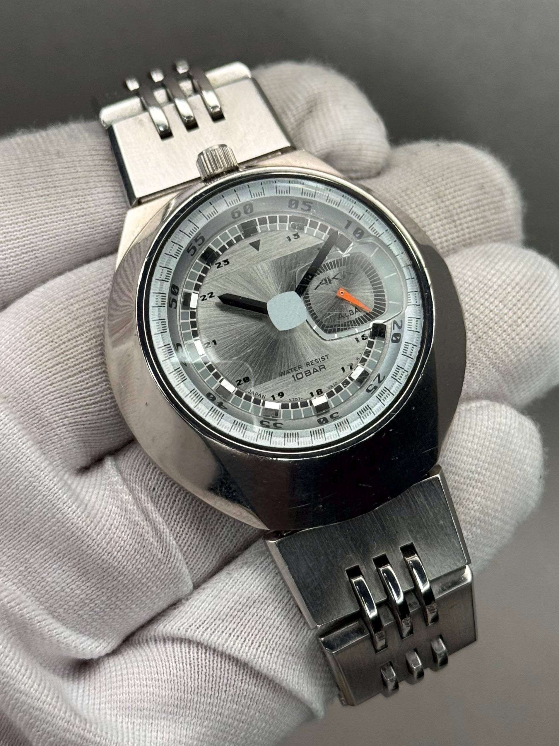 Vintage Seiko Alba AKA Bullhead V707-0A10 Quartz Watch – Silver