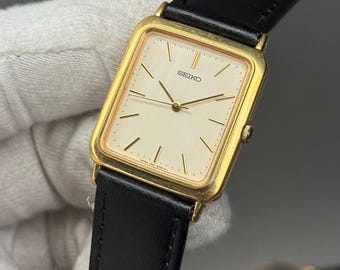 Reloj de cuarzo vintage Seiko Spirit 9533 5030 con esfera amarilla