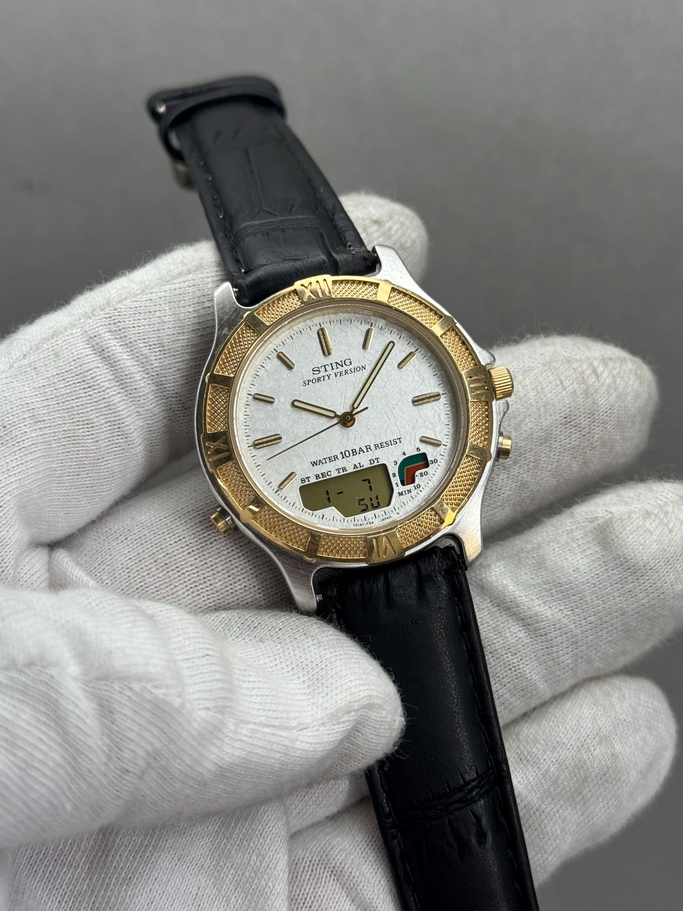 希少なCASIO Sting デュアルタイム STN-412W クォーツ テクスチャード 
