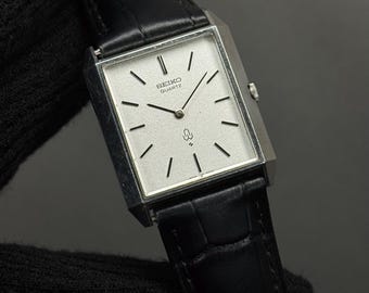 Reloj de cuarzo vintage Seiko Spirit 9533 5030 con esfera amarilla